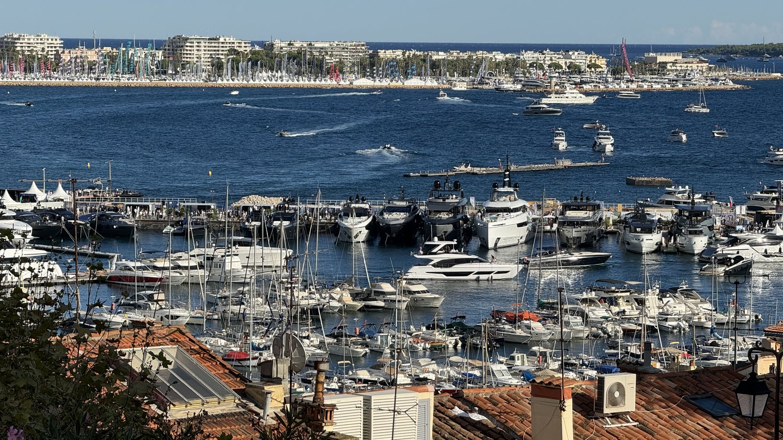 View over the harbour of Cannes with yachts and the bay behind